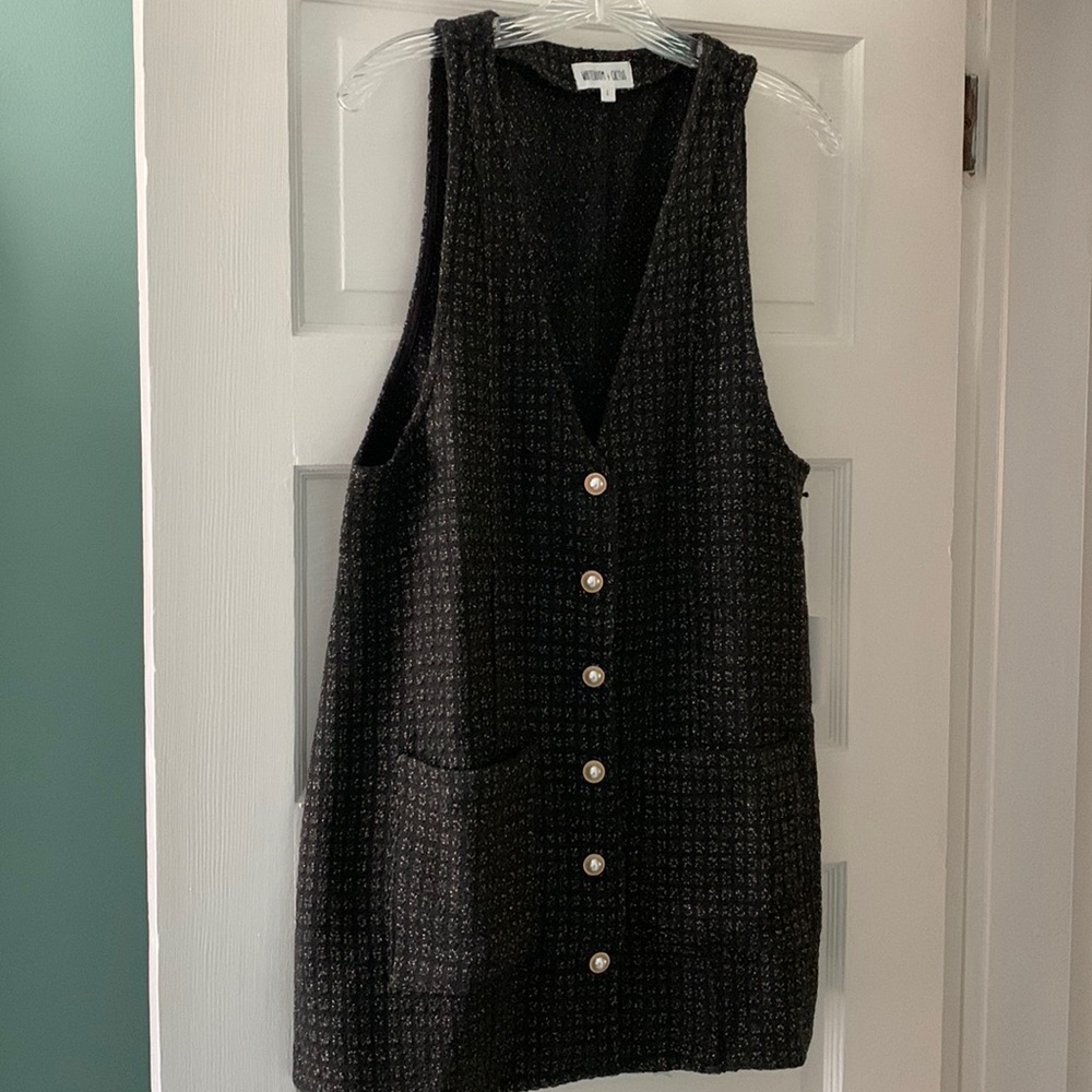 Black with gold speckles long vest or even a dress!